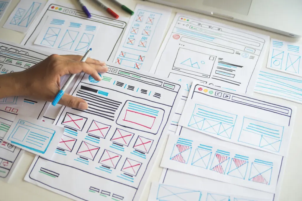 Web Design wireframes on a desk Web Design wireframes on a desk