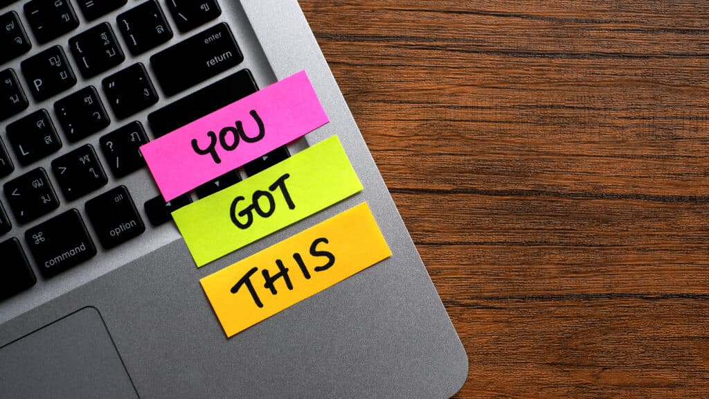 You Got This message concept written post it on laptop keyboard. The words "You got this" written on post it notes on a laptop
